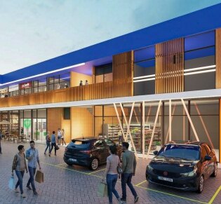 Perspectiva de centro comercial com estacionamento